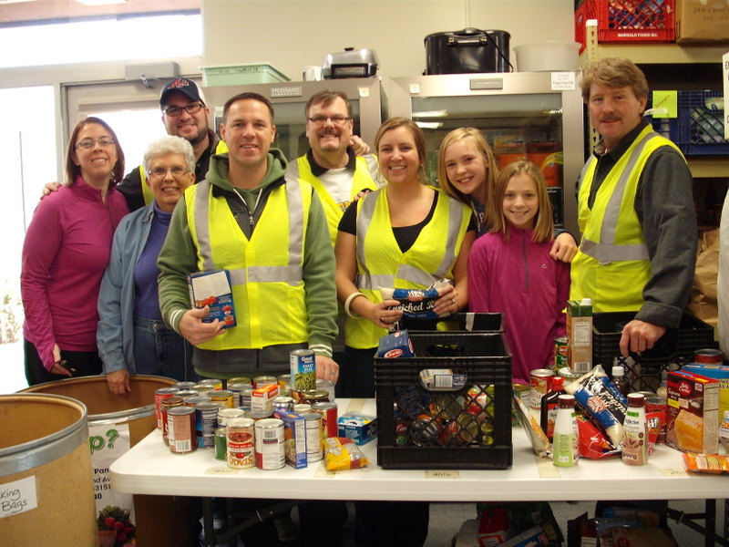 Helping at the food pantry Rotary Club of New Berlin